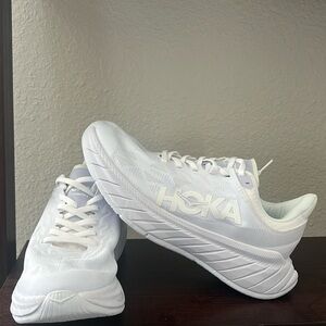 Hoka Carbon X 2 sneakers, size 8D.
